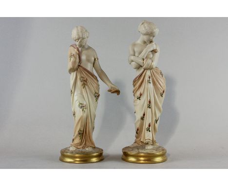 A pair of Royal Worcester porcelain figures, 'Love and Sorrow', modelled as half naked young ladies with floral robes, one ki