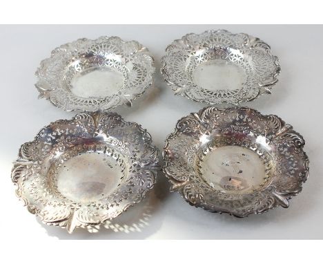A set of four Victorian silver bonbon dishes (two pairs), maker Richard Martin and Ebenezer Hall Sheffield 1862 and 1899, all