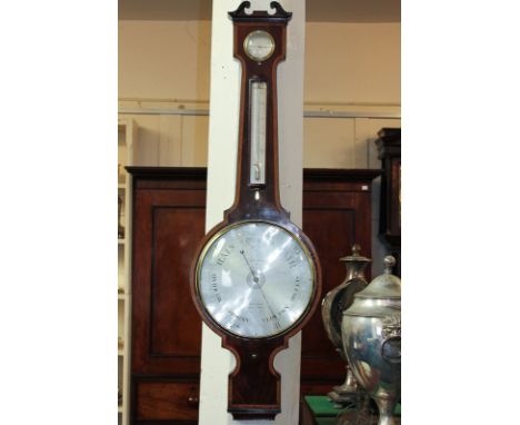 A good 19th century mahogany wheel barometer and thermometer with Kingwood banding, the large circular silverized dial signed