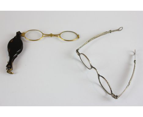 A tortoiseshell lorgnette and a pair of early 19th century silver glasses frames