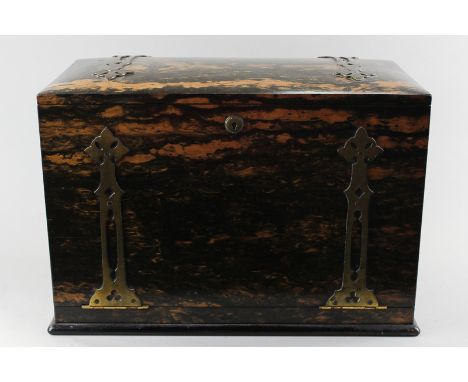 A good Victorian coromandel wood travelling writing cabinet with brass strap decoration, the hinged top and drop front reveal