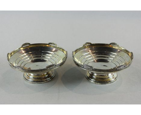 A pair of small silver bonbon bowls, maker R and D Birmingham 1937, with tiered bowls on stemmed bases