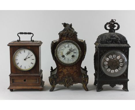 A 19th century French marquetry cased mantel clock another in embossed brass case and a mahogany cased mantel clock (NC)