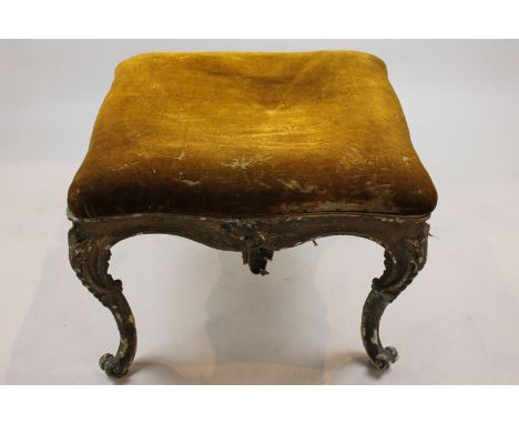 A 19th century French gilt gesso stool with upholstered seat on slender cabriole legs, 58cm (NC)