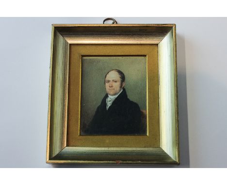 A miniature portrait of a seated man wearing a high collared black coat with white shirt, rectangular, 8cm by 7cm