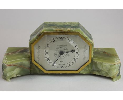 An Elliott clock, green onyx cased mantel clock stamped Ollivant and Botsford Manchester, with eight-day movement, 12cm  high