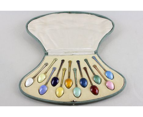 A set of twelve continental silver (925 mark) and enamelled coffee spoons, each a different colour, in case (case stamped Vik