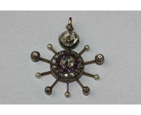 A late Victorian rose cut diamond and amethyst pendant with a central cluster within a ten rayed border and below a pear-shap