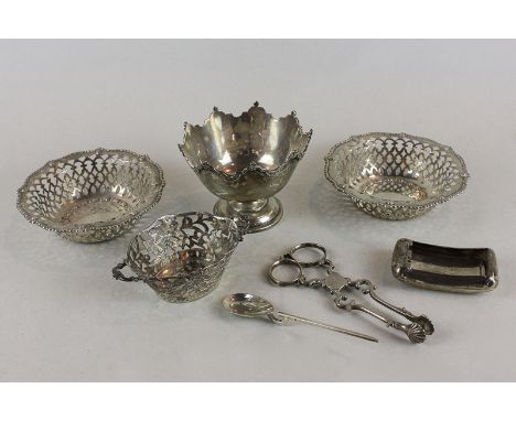 A pair of silver bonbon dishes, Birmingham 1913, with pierced edges, a small silver bowl, a continental 925 small basket, a p