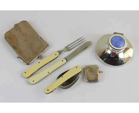 A Mappin and Webb silver and enamelled capstan inkwell, a silver Vesta case and three folding 'penknife' fork spoon and knife