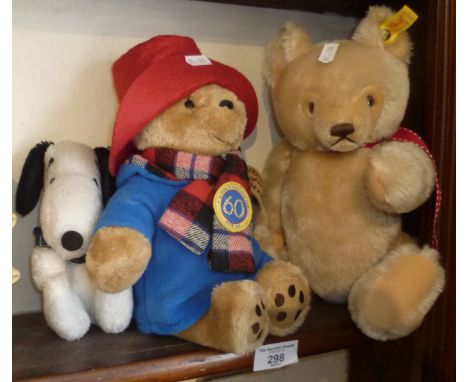 A Steiff teddy bear, Paddington Bear and a Snoopy