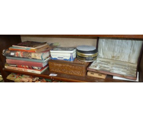 Two Anniversary Zippo lighters in tins, cased sewing tools and quantity of children's annuals, etc.