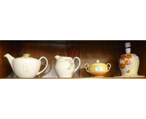 Art Deco china sucrier, a Bewsley pottery lamp base, a Poole pottery teapot and an Alfred Meakin flying geese jug
