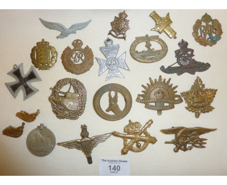 Group of 19 British and German Army Cap Badges and medals, WW1 and later