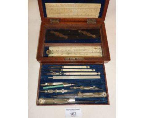 Late 19th c. draughtsman's tool or drawing set in two-tier fitted mahogany case. Pieces marked as Elliott and West of London
