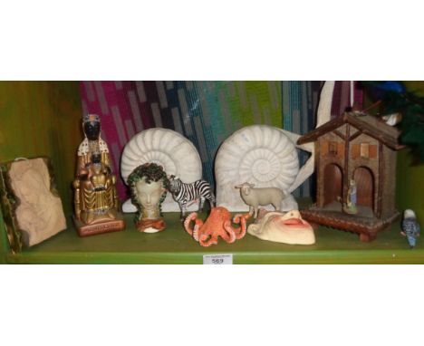 Pair plaster fossil bookends with assorted ornaments
