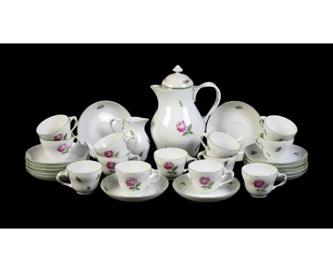 
	
		A modern Vienna part coffee service painted with pink roses, comprising: a coffee pot and cover; a milk jug; thirteen og