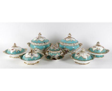 
	
		A Minton pale turquoise ground part dinner and dessert service, painted with flower sprays within gilt feuille de choux 