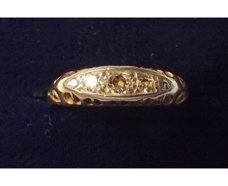 An 18 carat gold antique five stone diamond ring