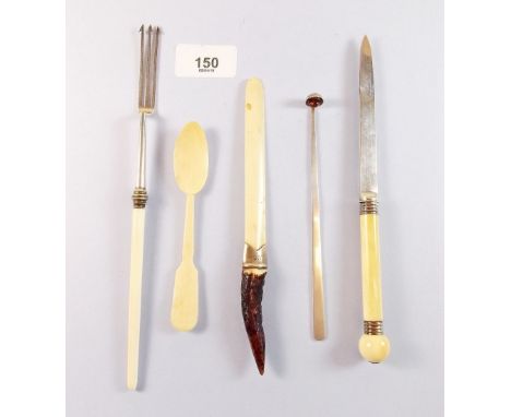 A silver and ivory paperknife 1886, a pickle fork 1909, a silver olive spoon, London 1965 and a horn handled silver mounted p