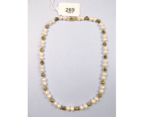 A freshwater pearl and enamel bead necklace