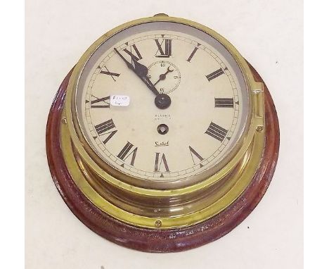A circular brass cased ships clock by Sistral - total diameter 23cm