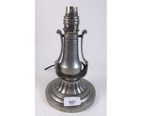 A silver plated swivel weighted desk lamp