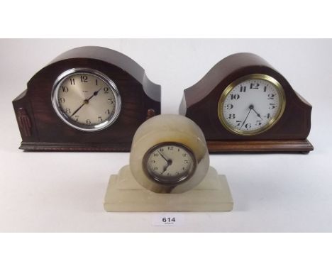 Two early 20th century eight day mantel clocks in oak and mahogany cases and an alabaster clock