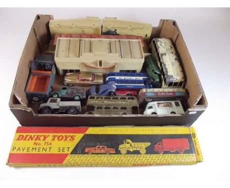 A Dinky Toys 754 pavement set with a Hornby station and various vehicles including a Mattoy clockwork bus, a Britains Land Ro