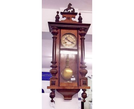 A late 19th century mahogany Vienna style wall clock