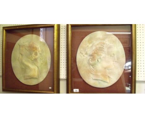A pair of Spanish ceramic portrait plaques of classical women by Cetres in glazed frame - 56 x 50cm 