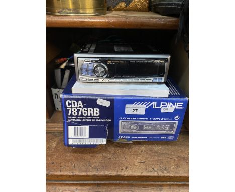 An Alpine CDA-7876RB car radio / CD receiver with mounting kit, manual and box. 