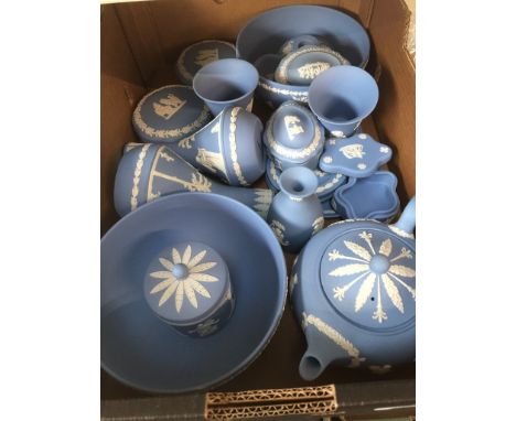 A box of Various blue Wedgwood Jasperware to include a teapot and 2 fruitbowls etc. 