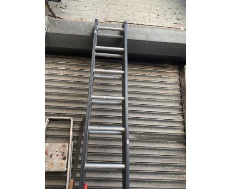 An Abru Steelite extending ladder 