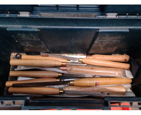 A toolbox with wood turning tools