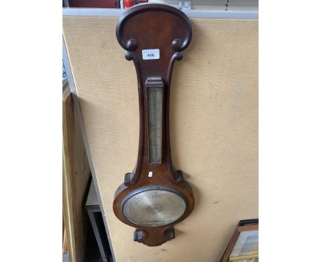 A wooden cased aneroid barometer - as found 