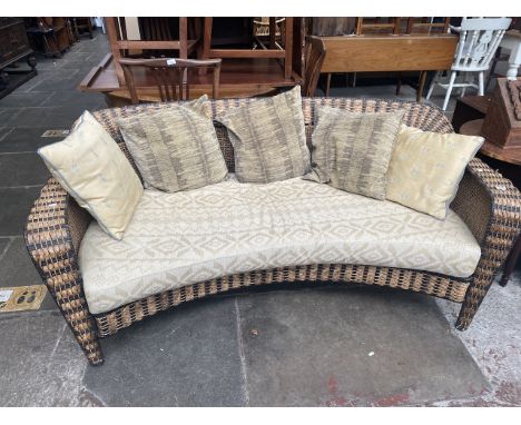 A rattan sofa. 