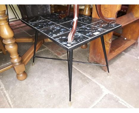 A retro mid 20th century tile top coffee table.Condition Report: After inspection it is clear that table is in good condition