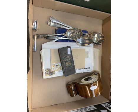 A mixed lot comprising a clock, two silver spoons, plated ware, stamps, Rowntree box. 