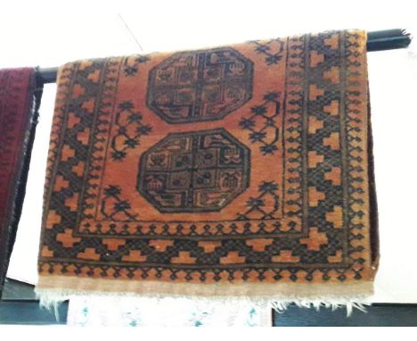 A vintage Eastern hand knotted wool carpet, orange ground 128cm x 78cm (approx) 