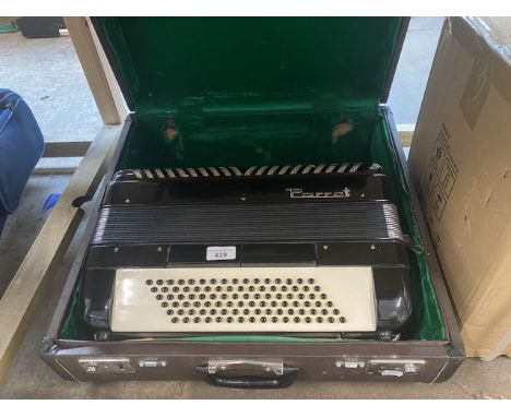 A Parrot piano accordion with case. 