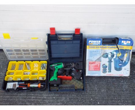 A Power Craft 1500w SDS Rotary Hammer Drill with accessories, cased, a Power Tool case with Kinetic Angle Power Drill, the ca