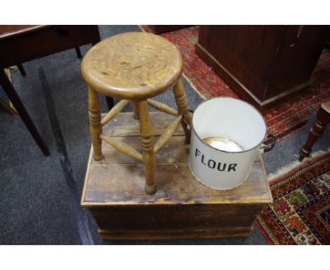 A 19th century pine tool chest; an enamel flour bin and elm milking stool (3) 