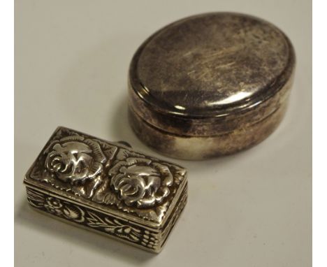 A 19th century silver rectangular snuff or pill box, London 2001; another (2)