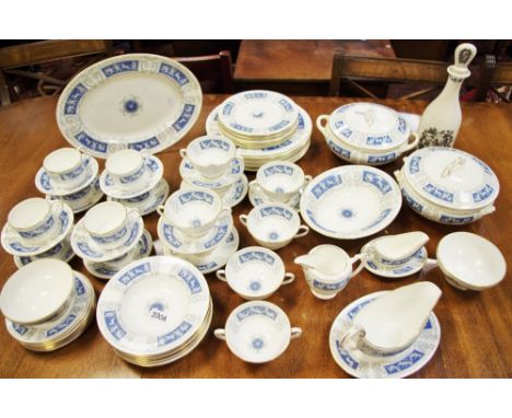 A Coalport Revelry pattern dinner service comprising of dinner plates, side plates, tea and coffee cups sugar bowl, etc