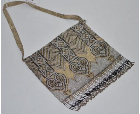 Vintage Fashion - An Art Deco metal mesh evening bag; allover geometric heart and banded pattern, fringed base, flap cover, g