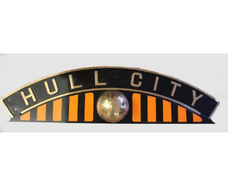 A replica cast brass and enamel painted 'Hull City' nameplate, 38 x 137 cm.The original name plate was used between 1936 and 