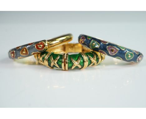 Group of three boldly styled vintage bangle bracelets by NLH (Nat Landau Hyman), each showcasing richly enameled designs with