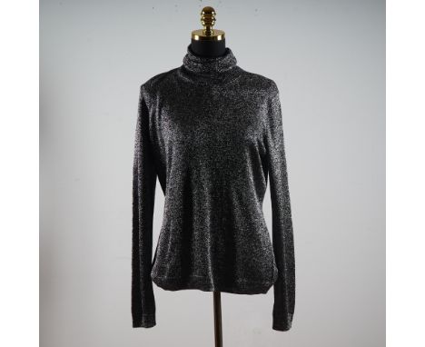 Step into the spotlight with this dazzling metallic turtleneck sweater by Brooks Brothers. Crafted from a stretch knit fabric