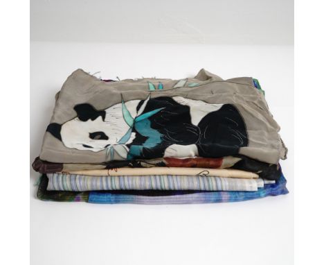 A vibrant ensemble of five fashion scarves blending designer sophistication with artistic charm. The standout piece is a Wort